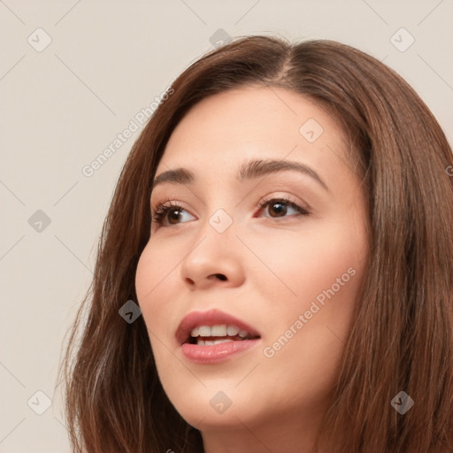 Neutral white young-adult female with long  brown hair and brown eyes