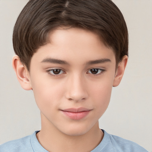 Joyful white child male with short  brown hair and brown eyes