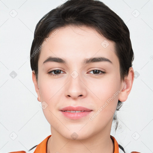 Joyful white young-adult female with short  brown hair and brown eyes