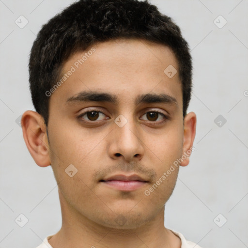 Neutral latino young-adult male with short  brown hair and brown eyes