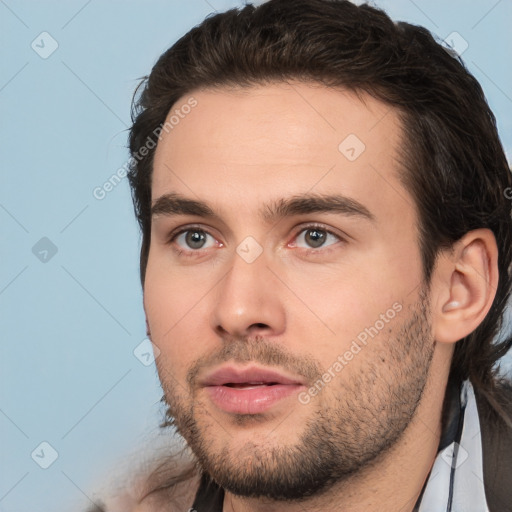 Neutral white young-adult male with short  brown hair and brown eyes