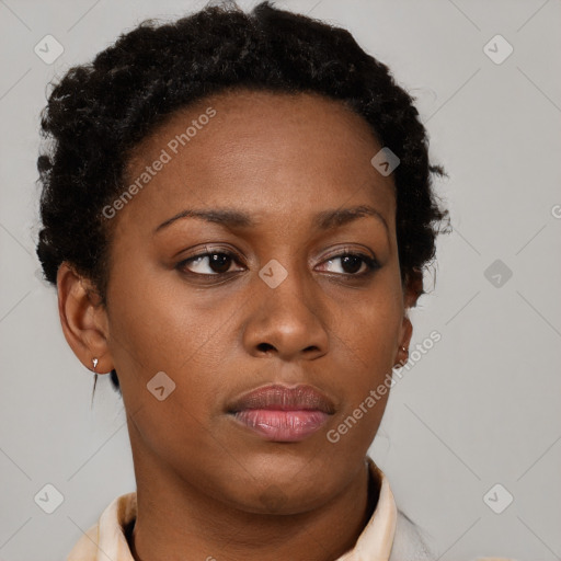 Neutral black young-adult female with short  brown hair and brown eyes