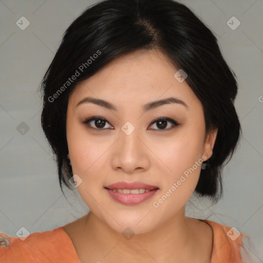 Joyful asian young-adult female with medium  black hair and brown eyes