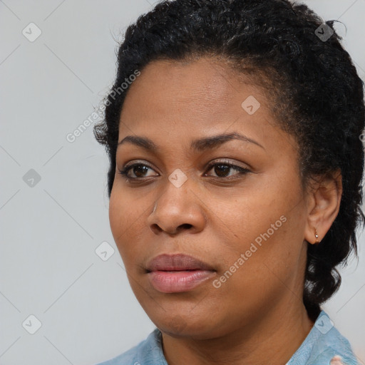 Neutral black young-adult female with short  brown hair and brown eyes