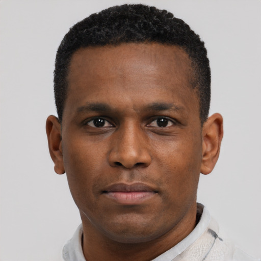 Neutral black young-adult male with short  brown hair and brown eyes