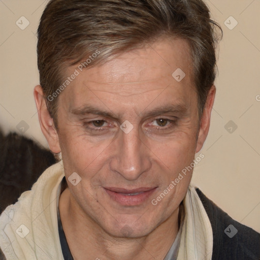 Joyful white middle-aged male with short  brown hair and brown eyes