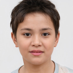 Joyful white child female with short  brown hair and brown eyes