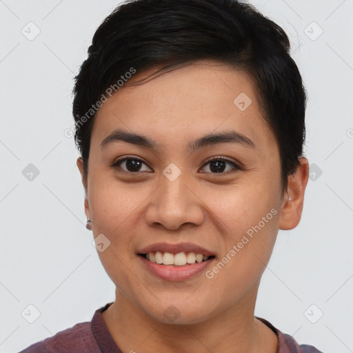 Joyful asian young-adult female with short  brown hair and brown eyes