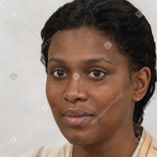 Joyful black young-adult female with short  brown hair and brown eyes