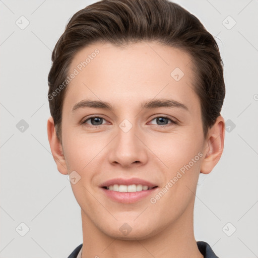 Joyful white young-adult female with short  brown hair and grey eyes