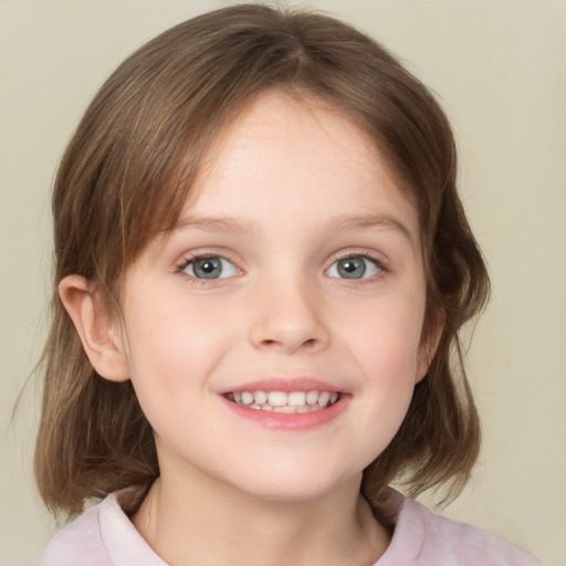 Joyful white child female with medium  brown hair and blue eyes