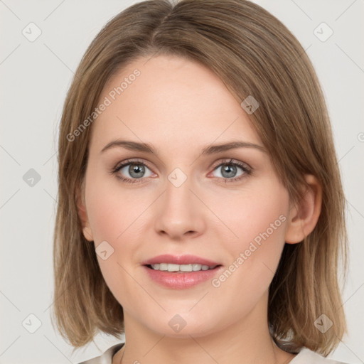 Joyful white young-adult female with medium  brown hair and green eyes