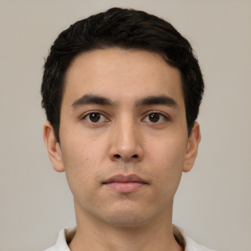 Neutral white young-adult male with short  black hair and brown eyes