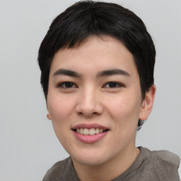 Joyful asian young-adult female with short  black hair and brown eyes