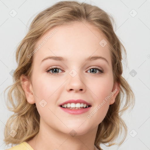 Joyful white child female with medium  brown hair and blue eyes