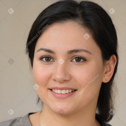 Joyful white young-adult female with medium  brown hair and brown eyes