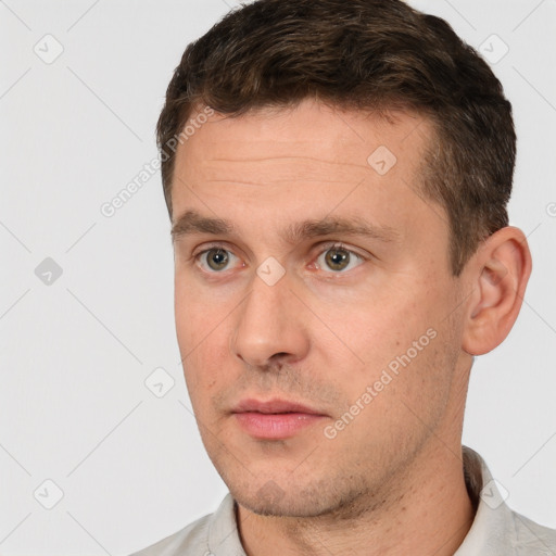 Neutral white adult male with short  brown hair and brown eyes