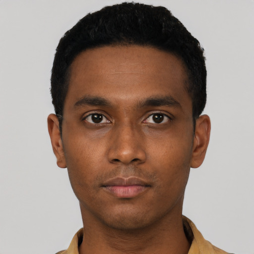 Neutral black young-adult male with short  black hair and brown eyes