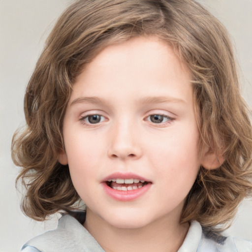 Joyful white child female with medium  brown hair and blue eyes