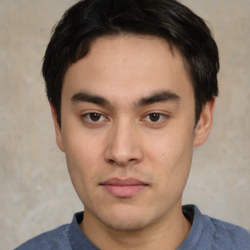 Neutral white young-adult male with short  black hair and brown eyes