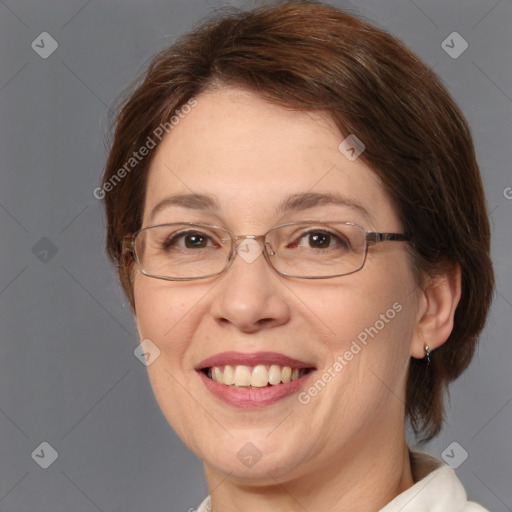 Joyful white adult female with medium  brown hair and brown eyes