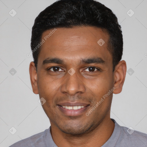 Joyful latino young-adult male with short  black hair and brown eyes