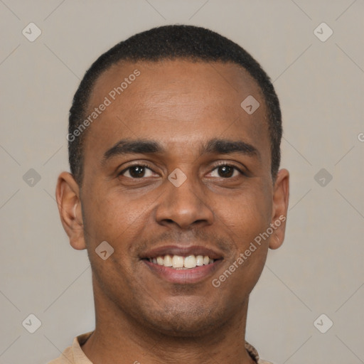 Joyful latino young-adult male with short  brown hair and brown eyes