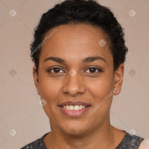 Joyful black young-adult female with short  brown hair and brown eyes