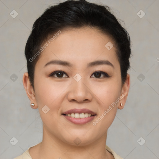 Joyful asian young-adult female with short  brown hair and brown eyes