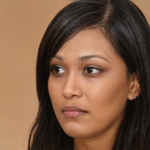 Neutral asian young-adult female with long  brown hair and brown eyes