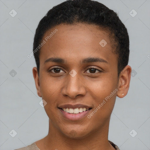 Joyful black young-adult female with short  brown hair and brown eyes