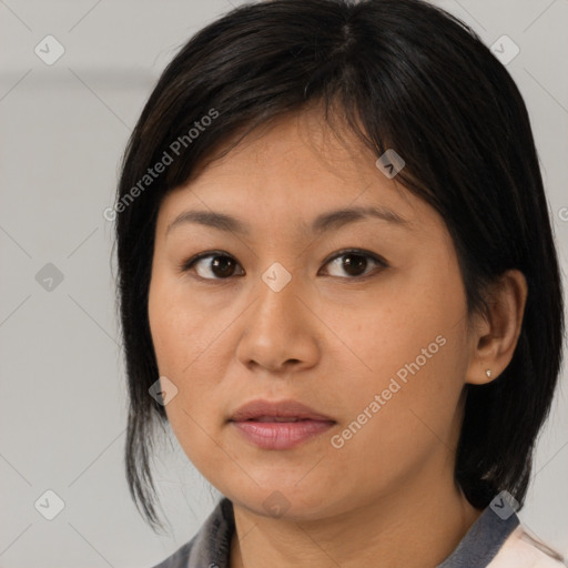Neutral asian young-adult female with medium  brown hair and brown eyes