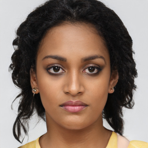 Neutral black young-adult female with long  black hair and brown eyes