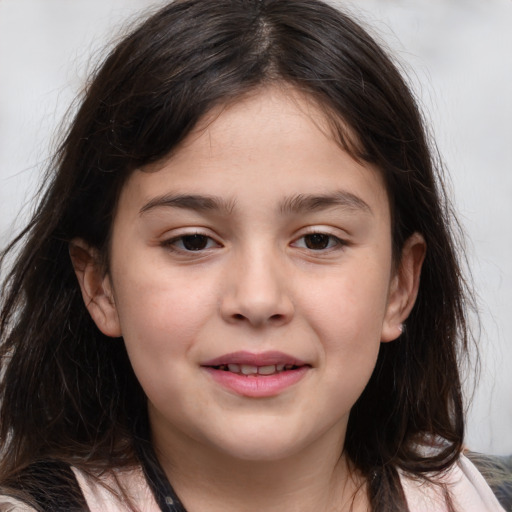 Joyful white child female with medium  brown hair and brown eyes