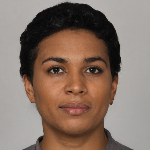 Neutral latino young-adult female with short  black hair and brown eyes