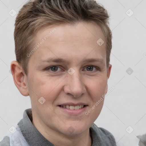 Joyful white adult female with short  brown hair and grey eyes