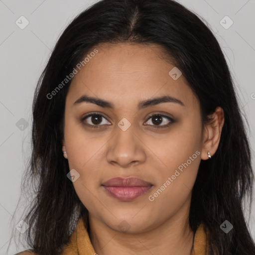 Joyful latino young-adult female with long  brown hair and brown eyes