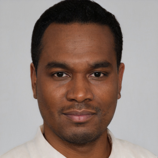 Neutral black young-adult male with short  black hair and brown eyes