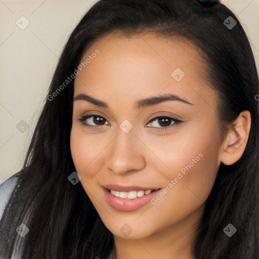 Joyful latino young-adult female with long  black hair and brown eyes