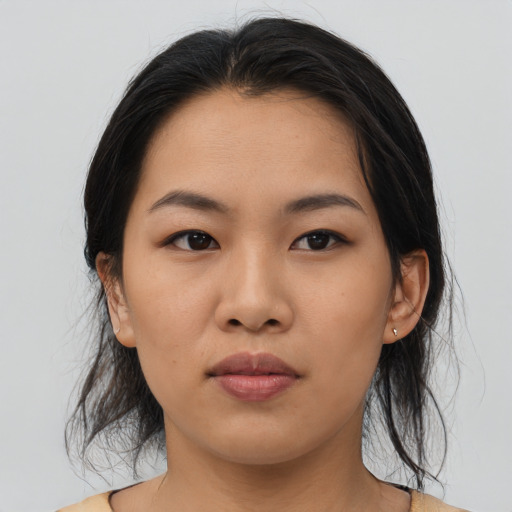Neutral asian young-adult female with medium  brown hair and brown eyes