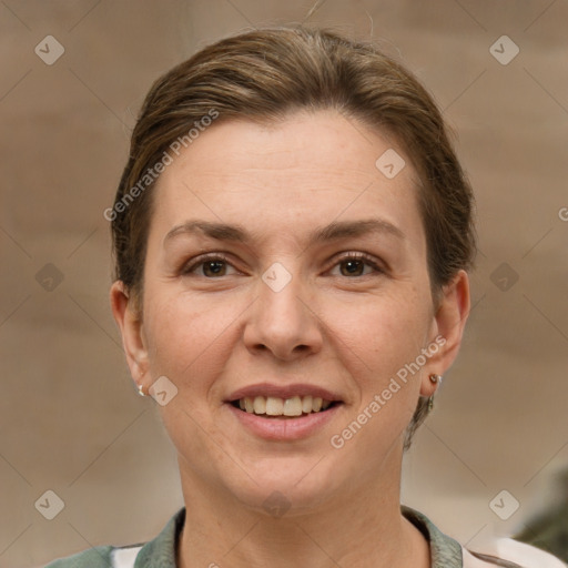 Joyful white adult female with short  brown hair and brown eyes