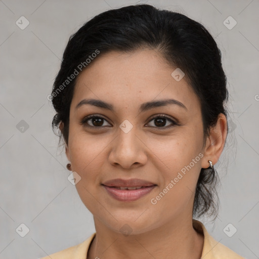 Joyful latino young-adult female with medium  brown hair and brown eyes