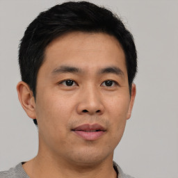 Neutral asian young-adult male with short  black hair and brown eyes