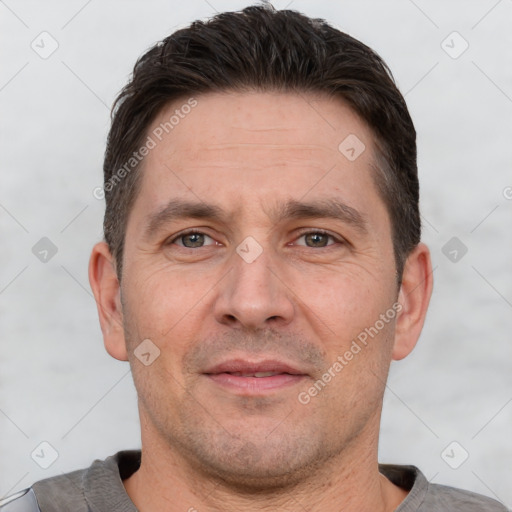 Neutral white adult male with short  brown hair and brown eyes