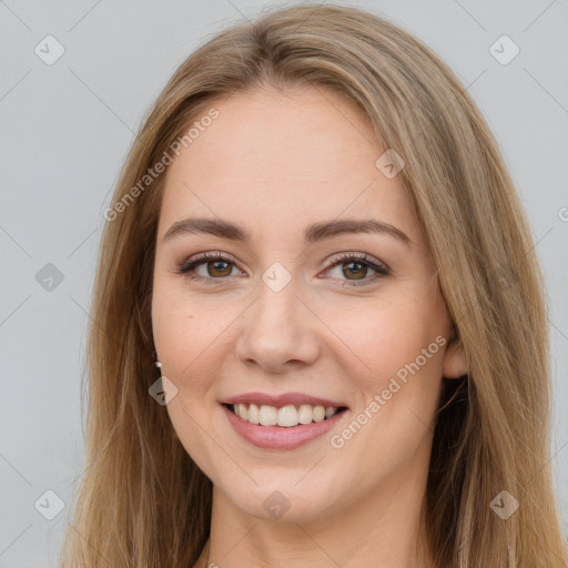 Joyful white young-adult female with long  brown hair and green eyes