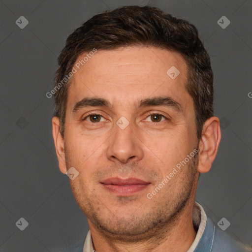 Joyful white adult male with short  brown hair and brown eyes