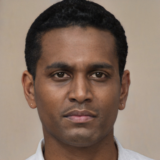 Neutral black young-adult male with short  black hair and brown eyes