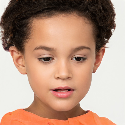 Joyful white child female with short  brown hair and brown eyes