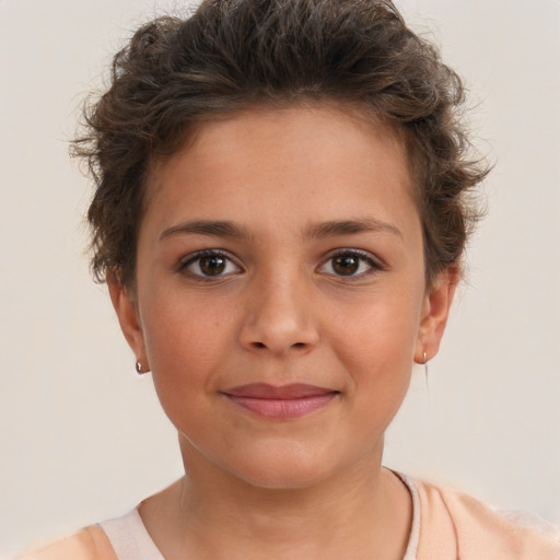 Joyful white child female with short  brown hair and brown eyes