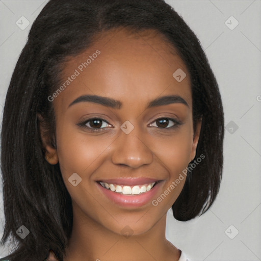 Joyful black young-adult female with long  brown hair and brown eyes